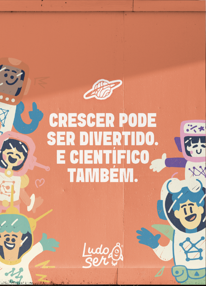 Mural da Clínica LudoSer com a frase Crescer pode ser divertido e científico também